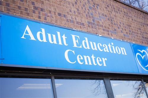Outside sign of Adult Education Cetner 